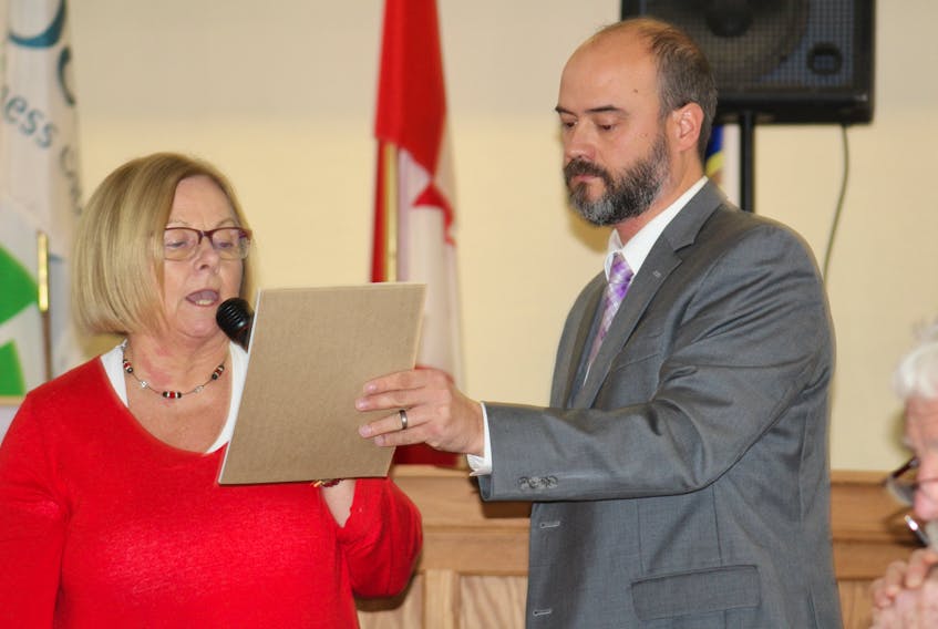 For the second time in two years, Betty Ann MacQuarrie was sworn in as warden of Inverness County Thursday, shortly after two-thirds of council had voted to remove her as warden. After a subsequent vote to select a new warden resulted in a tie, MacQuarrie's name was picked from a basket. County CAO Keith MacDonald administered the oath of office.