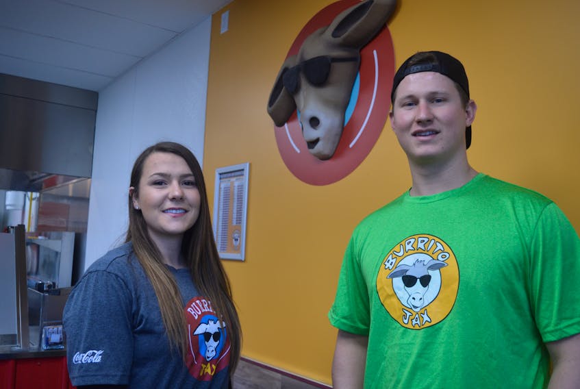 Cousins Erika Usher and Nick Walsh, both 22, became business partners earlier this year following their graduation from Cape Breton University’s business administration program. Their first business venture, a quick service restaurant franchise Burrito Jax, opens today at 11 a.m. in the Value Check Plaza on Kings Road in Sydney River.