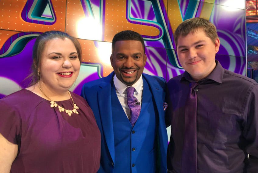 Aaron McMullin, right, of River Ryan, with sister Kari McMullin, 24, and America’s Funniest Home Videos host Alfonso Ribeiro at the Walk of Fame in Los Angeles. McMullin and his sister were flown to Los Angeles after he was chosen as a finalist for an episode of the America’s Funniest Home Videos television show.