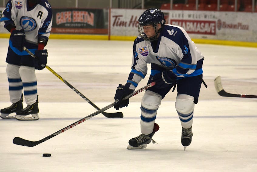 Nick Mahar of the Cape Breton Unionized Tradesmen carries the puck during Nova Scotia Eastlink Major Midget Hockey League action in September. The Tradesmen have applied to host the 2021 Telus Cup national midget championship and Mahar is eligible to play with the Cape Breton club during that season.