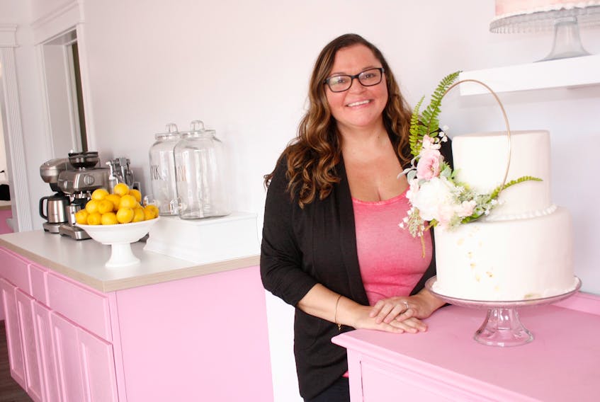 Not Just Cakes owner Tara Parsons-Donovan poses inside her new storefront located on Keltic Drive in Sydney River.
