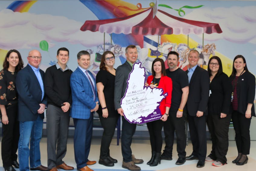 The Caleb’s Courage Fund received a $25,000 donation from True North Clinical Research on Tuesday. From left are Cheryl Marsh, David Huntington, Rick McCarthy, Cape Breton Regional Hospital Foundation CEO Brad Jacobs, Rikki Jagger, True North principal investigator Mark Johnston, Caleb’s parents Nicole and Mike MacArthur, Keith O'Neill, Tara Baker and Jennifer Swan.