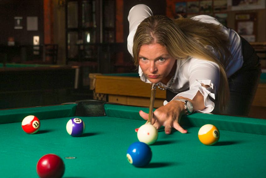 Former Cape Breton University basketball star Janice Moseychuck, pictured here at Locas Billiards in Halifax, recently won an 8-ball singles tournament in Las Vegas.