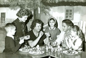 Children being instructed in painting Ukrainian Easter eggs (pysanky) at the Ukrainian Hall in Whitney Pier, circa 1970. Identified in the photograph are Catherine Sawka, Annie Hawrylak and Natalie Pronko.