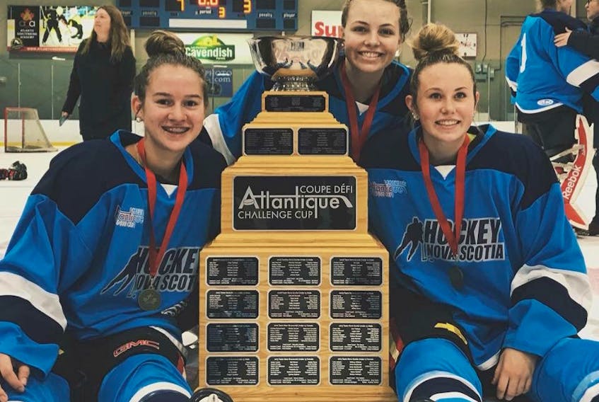 Members of the Nova Scotia under-18 team that captured gold at the Atlantic Challenge Cup in Moncton on Monday, from left, Erin Denny of Eskasoni, Nicole MacNeil of Sydney and Aimee O’Neill of Glace Bay.