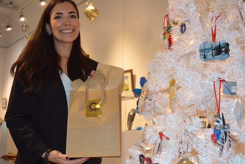 Elizabeth Slaunwhite, the marking manager at the Cape Breton Centre for Craft and Design, displays a Christmas gift bag at the centre where they are preparing to host the annual ‘Relax, it’s in the Bag’ shopping event Thursday from 10 a.m.- 7 p.m.