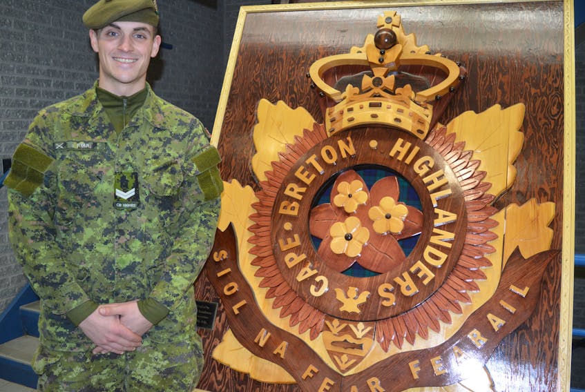 Cpl. Kyle Ryan poses for a photo at the Victoria Park Armouries in Sydney. The 21-year-old university student from Howie Centre joined the infantry reserves unit when he was 19.