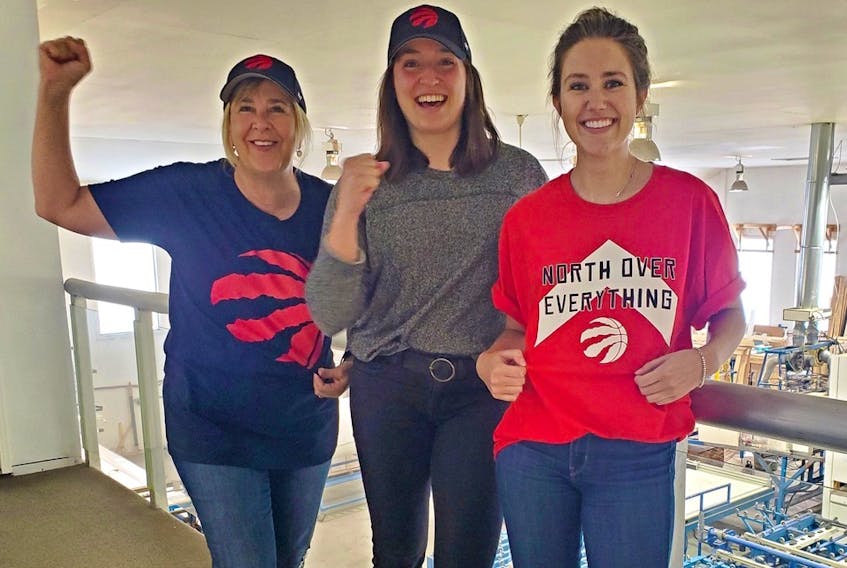 A Cape Breton company has played a small part in the Toronto Raptors success this season. Advanced Glazings Ltd. of Sydney has provided natural light with a large skylight to the Raptors dressing room through their solera product at the NBA team’s practice facility. Members of the company are shown supporting the Raptors, from left, Michelle Milburn (Chief Operating Officer), Sara Ripley and Breagh Gromick.