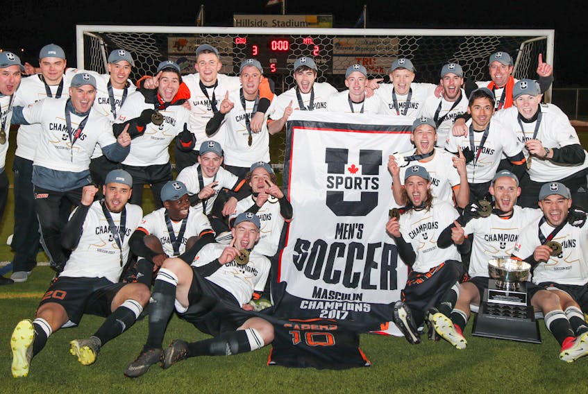 The Cape Breton Capers men's soccer team celebrate after winning the U Sports national championship on Sunday in Kamloops, B.C. (U Sports photo)