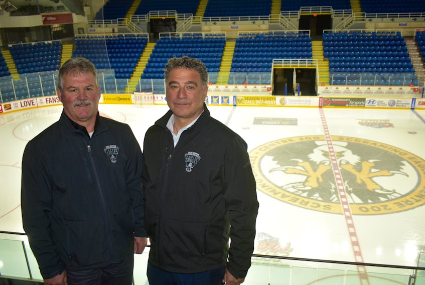 Irwin Simon, right, stands with Gerard Shaw, president of the Cape Breton Screaming Eagles, following the team's practice at Centre 200 on Monday. Simon will be introduced as part of the Screaming Eagles ownership group at a press conference, scheduled for Tuesday at noon at Centre 200 in Sydney.
