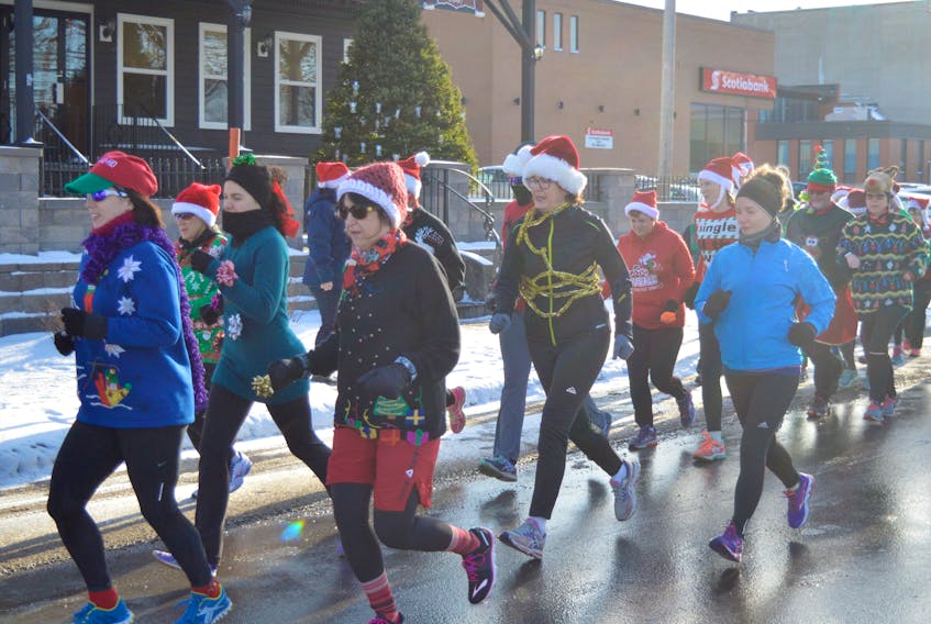 Runners took to the streets of downtown Sydney in their finest Christmas-themed regalia to take part in the 2016 edition of the Ugly Sweater Run, which benefits children in crisis at Transition House.