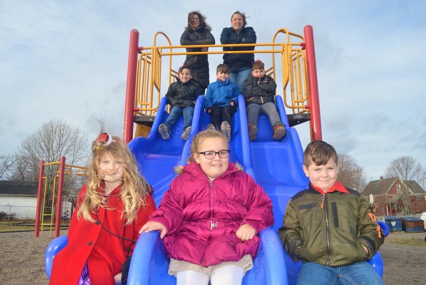 The Miners Memorial Playground has officially been moved from the former St. Joseph’s elementary school to Jubilee Elementary School in Sydney Mines. The playground equipment was installed at its new location at the end of November. Having a look at the new playground recently were, from left, front row, Sarah Fortune, Charlee Penny and Isaac Fortune, middle row, Sam Young, Ben Young and Noah Fortune and back row, Kate Taylor-Young and Tracy Penny.