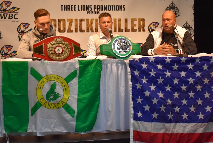 Ryan Rozicki, left, and Shawn Miller, right, are shown during a press conference at Centre 200 on Wednesday with Three Lions Promotions managing director Daniel Otter. Rozicki and Miller will be the main event for the All or Nothing boxing card, scheduled for Saturday at the Sydney venue. The fight will be for the WBC International Silver cruiserweight championship. Doors open for the fight card at 6 p.m. with the fights beginning at 7 p.m.