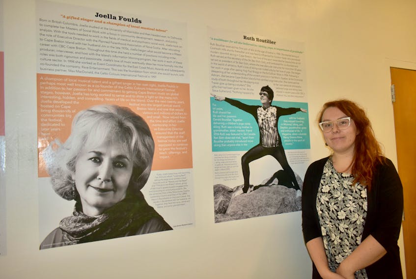 Savannah Anderson, communications assistant and co-ordinator with New Dawn’s Centre for Social Innovation, stands among the exhibits in the centre’s Cape Breton Women’s Gallery.