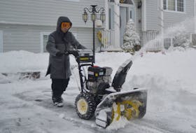 David Tran used the snowblower to clear his south end Sydney driveway after a snowfall on Jan. 30. There were two major storms in the Cape Breton Regional Municipality in January but less than 20 centimetres of snow fell in February.
