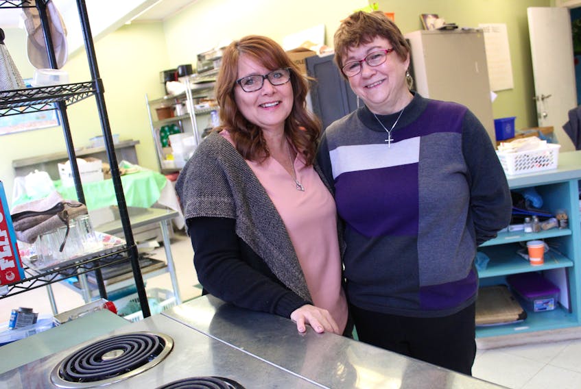 Brenda Jessome, left, and Eileen MacNeil along with Eileen Butts-Robinson (not shown) have bonded over their personal tragedies. The three women are serving up Thursday night pub meals at the Sydney Mines fire hall to raise money for a youth outreach centre in their community.