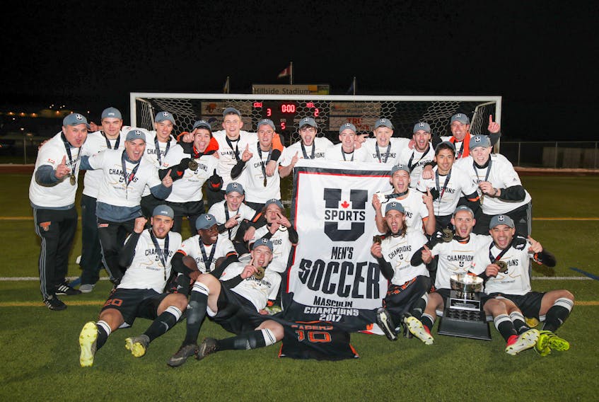 The Cape Breton Capers men's soccer team celebrates after winning the U Sports national championship on Nov. 12, 2017 in Kamloops, B.C.