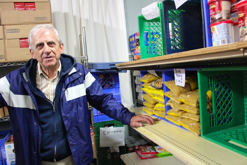 Lawrence Shebib stands inside the North Sydney’s community food bank which averages 170 family visits each month.