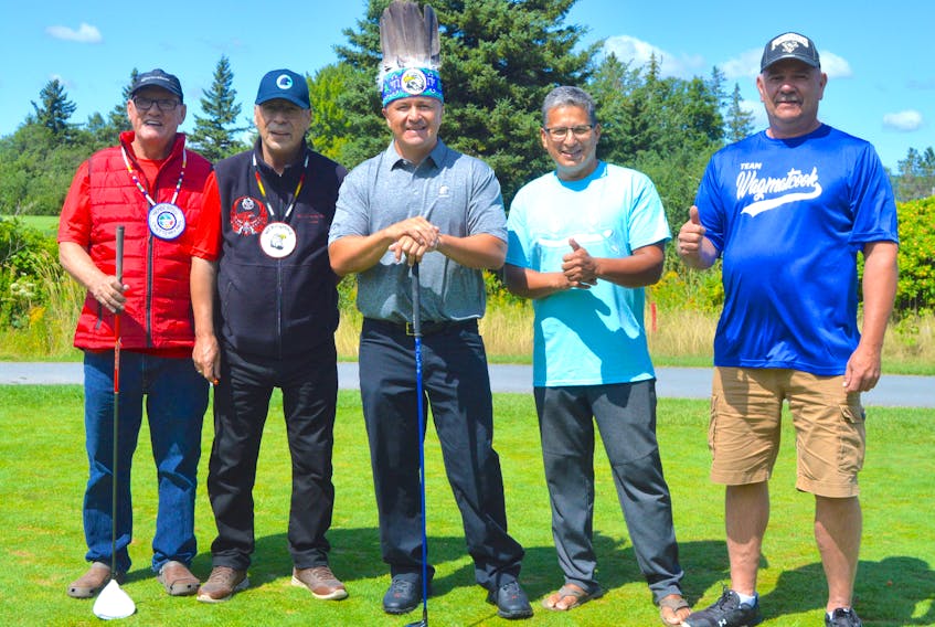 The five Unima’ki chiefs pose for a picture during their ceremonial tee shots that kicked off the 2018 Nova Scotia Mi’kmaw Summer Games at The Lakes Golf Course in Ben Eoin on Sunday. The Eskasoni-hosted Games run through Sunday, Aug. 26. Above from left: Membertou Chief Terry Paul, Waycobah Chief Rod Googoo, Eskasoni Chief Leroy Denny, Potlotek Chief Wilbert Marshall and Wagmatcook Chief Norman Bernard.