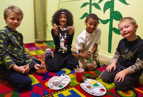 Clifford Street Youth Centre, through a grant from the Mental Health Foundation of Nova Scotia, has launched a Christmas initiative aimed and positive and community thinking. The program includes painting Christmas rocks. From left are Aaden Francis, Drewcilla Burke, Junior Burke and Jordan Matthews. (Photo Submitted/Rebecca Walker)