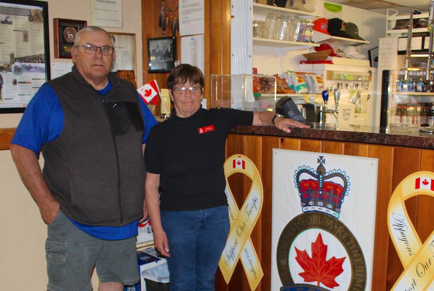 New Waterford Legion first vice-present Mike Odo, left, and bartender Leona Hartling inside the establishment on June 18, just after the doors re-opened after being closed for a month. A new executive for the legion was elected on June 13, after being closed for a month when members of the former executive suddenly quit.