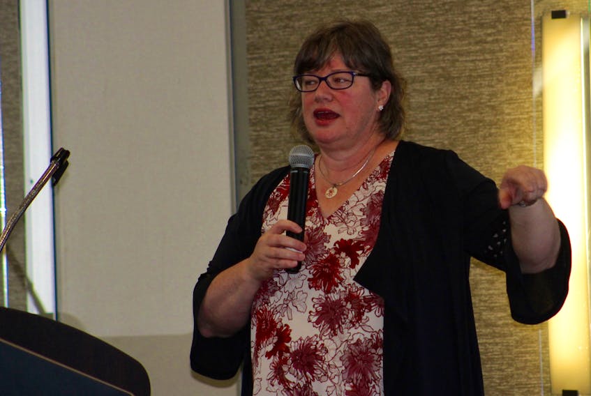 Dr. Christy Simpson speaks about health ethics when practising in a rural setting during the annual Cape Breton Cancer Symposium health in Sydney Friday. It was the 19th symposium held and its focus was on advances that have occurred in cancer care
