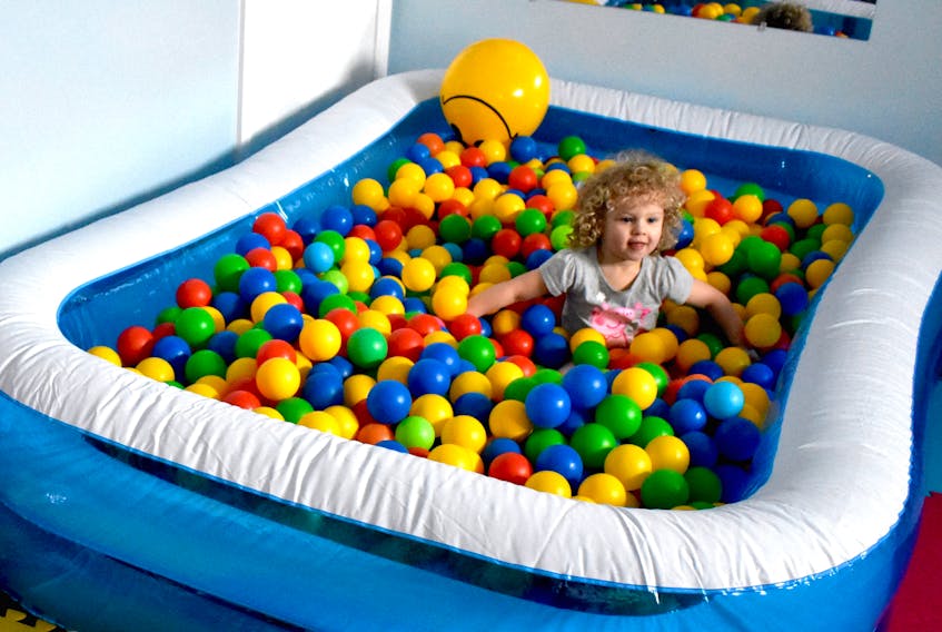 Linaya MacNeil, age two, plays in the ball pool at My Father’s House church in Glace Bay. The ball pool is part of the two play areas that are used for the special needs playgroup run by Jocelyn Ogden, who started the program 25 years ago when she found there was little she could do with her autistic son.