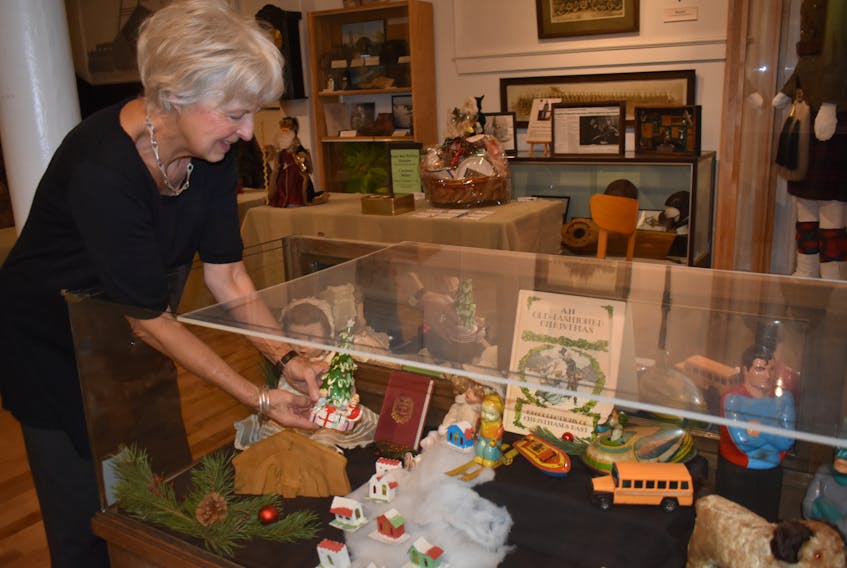 Elke Ibrahim puts the finishing touches on the Christmas display in Glace Bay Heritage Museum on Nov. 18. The not-for-profit organization is getting ready for their biggest fundraiser of the year – Old Town Hall Christmas Bazaar and Tea on Nov. 25.