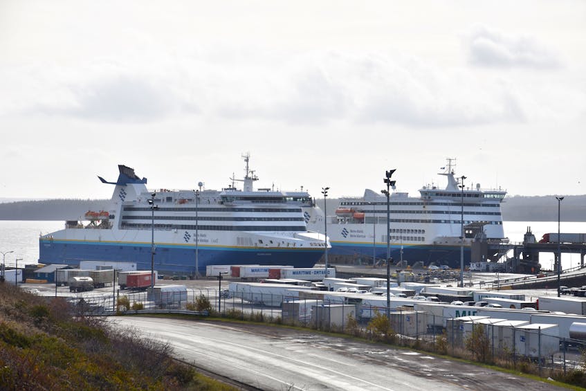 Marine Atlantic ferries are shown docked at the company’s terminal in North Sydney in this file photo. Marine Atlantic has issued a travel advisory for a potential impact of crossings for Saturday and Sunday, Christmas Eve.