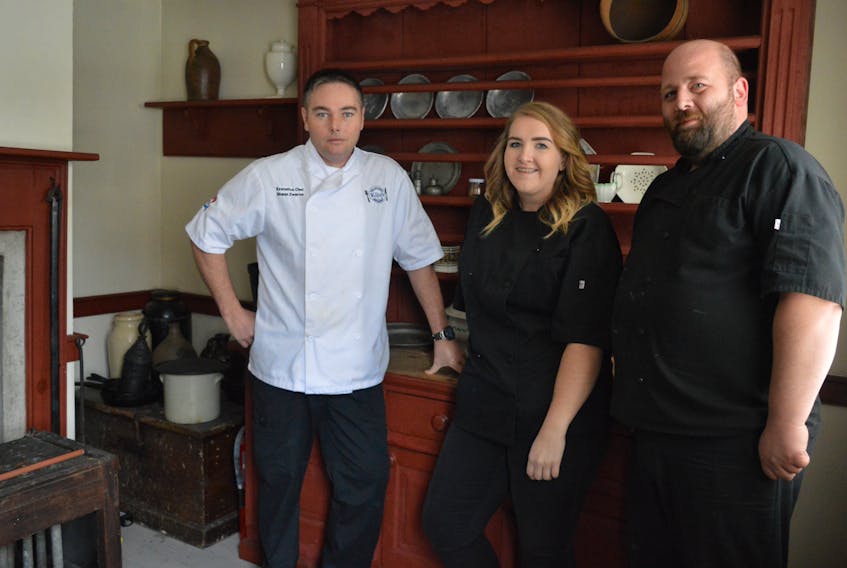 From left, chefs Shaun Zwarun, Aimee McDougall and Wayne Odo are three of the local chefs featured in “Nova Scotia Cookery, Then and Now” cookbook. They are seen here at Cossit House in Sydney, one of the historic locations used to photograph the dishes in the book.