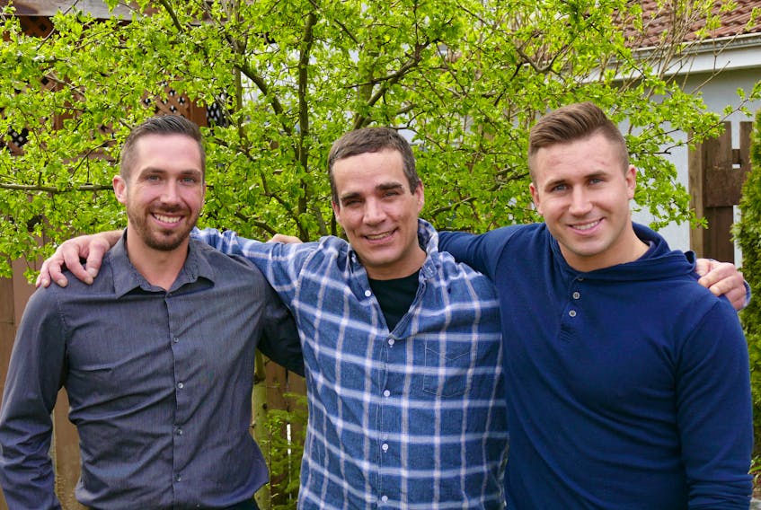 Danny MacKillop, centre, a native of Reserve Mines, is seen here at a rehabilitation centre in Vancouver, B.C., with facility staff Daniel MacEachern, left, a native of Glace Bay, and Landon Dorval.