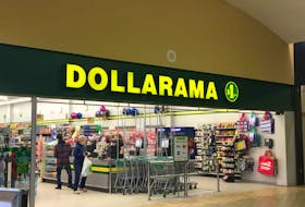 Shoppers are shown recently at the checkout of the current Dollarama location at the North Sydney Mall. Construction is underway for the new Dollarama at the mall, which will be located in the former Bargain Shop space.