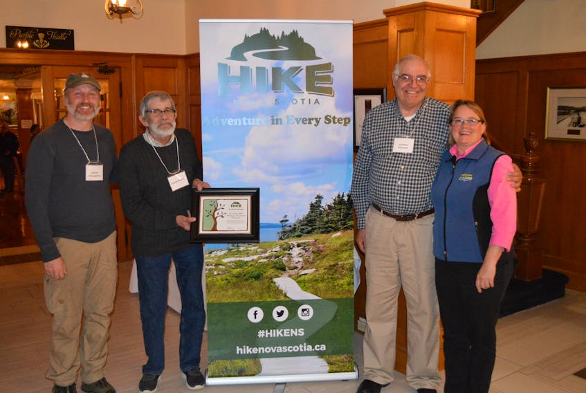 Hike Nova Scotia president Garnet McLaughlin, Coxheath Hills Wilderness Recreation Association representatives Emile Roach and Andy Pittman and Hike Nova Scotia past president Debra Ryan took part in the recent Hike Nova Scotia summit where the Coxheath group was presented with the Summit Award.