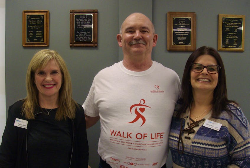 Lee MacEachern, a client at the Cape Breton Heart & Lung Wellness Centre in Membertou, with nurse Patricia Chant, left, and secretary Kelly MacLeod.