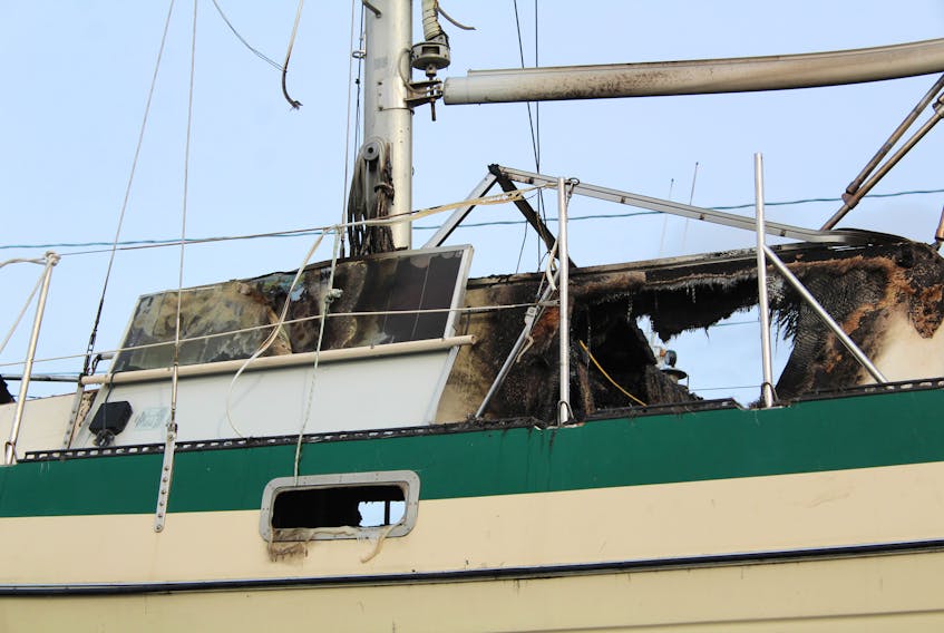 The Elonwy was docked at the Ballast Grounds wharf in North Sydney when it caught on fire Saturday night.