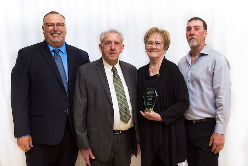The Boudreau family poses with the Jack Hartery Memorial Lifetime Achievement in Business Award at the Strait Area Chamber of Commerce annual general meeting and awards gala on Wednesday in Port Hawkesbury. From left are Chuck Boudreau, Herman Boudreau, Norma Boudreau and Kevin Boudreau.