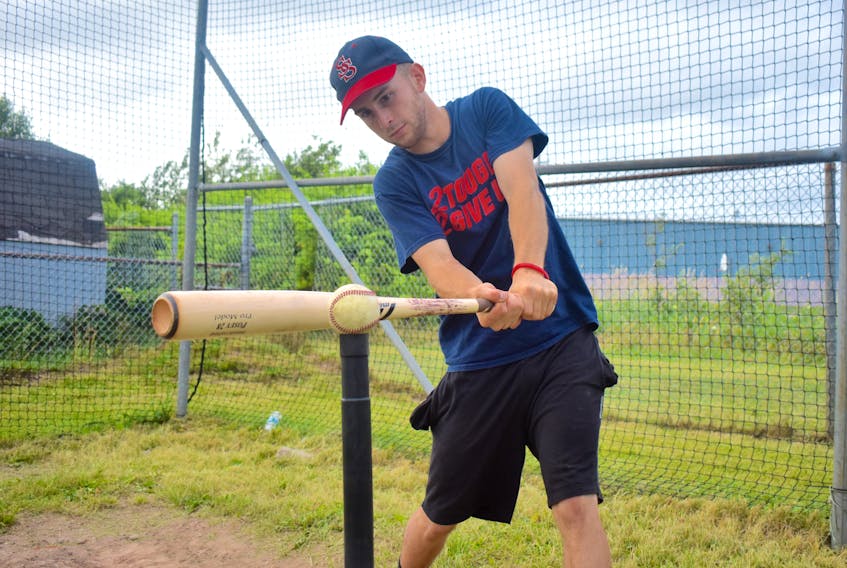 Chris Farrow of the Sydney Sooners takes batting practice in the cage at Susan McEachern Memorial Ball Park in Sydney on Thursday. The Sooners will host the Halifax Pelham Molson Canadians in a three-game weekend series beginning Friday in Sydney.