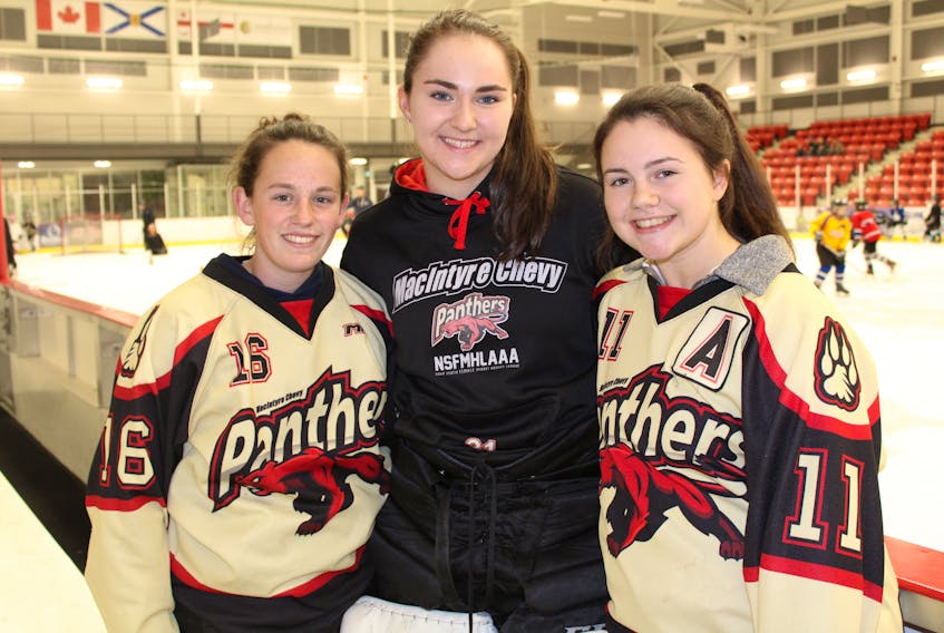 The MacIntyre Chevy Panthers will lean on experience this season in the Nova Scotia Female Midget ‘AAA’ Hockey League. From left, team veterans Jessie-Helen MacNeil, Julia Carroll and Annie Gillis.
