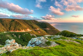 The Cabot Trail is seen from the Skyline Trail at sunset in Cape Breton Highlands National Park. Cape Breton tourism operators saw widespread declines in visitor traffic over the summer months after the record numbers set in 2017 from the year-long Canada 150 celebrations.