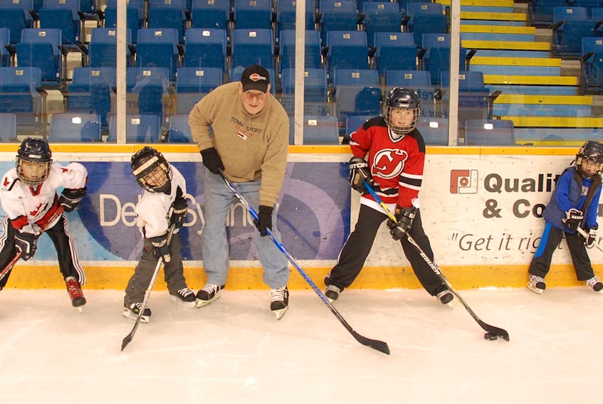 Terry McCarron is shown on the ice at Center 200 in 2007 with his grandkids, from left, Brody, Andrew, Dillon and Coby.
