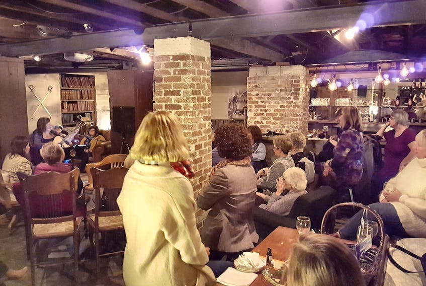 Shelley Allan of Helle's Belles performs at a Women’s Wednesday event at the Higher Grounds Café/Cellar Pub on Commercial Street in North Sydney. The sessions are held the second Wednesday of each month. The objective of the session is to provide a warm, welcoming and fun environment for women to take inspiration and encouragement from each other’s stories, ideas and talent.