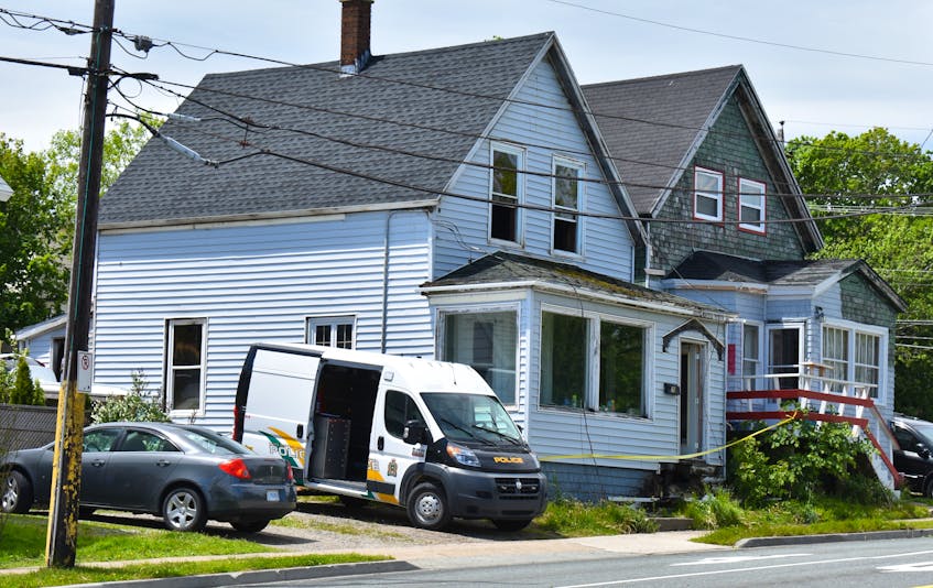 A Cape Breton Regional Police forensic identification unit vehicle is shown outside 26 Blowers St., North Sydney on Tuesday. The home, located near the corner of Blowers and Pleasant streets, was hit by a fire on Saturday afternoon. The fire is under investigation.