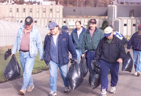 Coal miners leave the Prince Mine for the last time on Nov. 23, 2001 at 2 p.m. after the federal government announced the closure of the industry in Cape Breton.