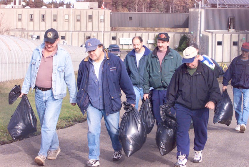 Coal miners leave the Prince Mine for the last time on Nov. 23, 2001 at 2 p.m. after the federal government announced the closure of the industry in Cape Breton.