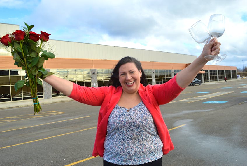 Kim MacDonald of New Waterford stands outside the Membertou Sports and Wellness Centre in Sydney as she prepares for five different speed dating events she is hosting, each targeting a specific group.