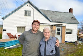 Jeremy Locke, owner of Locke’s Roofing and Construction in Bridgeport, stands with Jeanette MacDonald outside her home in Glace Bay. Locke, seeing her roof was in deplorable shape, simply knocked on her door offering to replace it for free back in the spring, but it took a little trick months later to get her to accept. MacDonald said she’s extremely grateful to Locke, as her roof has been bad for a couple years, but this past year took a beating with storms and there are numerous leaks in the house.