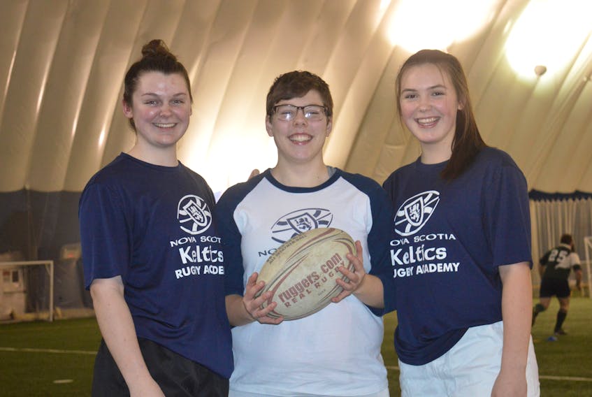 Three Cape Breton rugby players, from left, Makenna Norris, Neelie Fliegel-Doucet and Madison MacInnis, have been selected to the join the Nova Scotia Keltics under-18 girls rugby team that leaves March 7 for a 10-day trip to Ireland. A Glace Bay businessman has organized a fundraiser to help the three young women with expenses.
