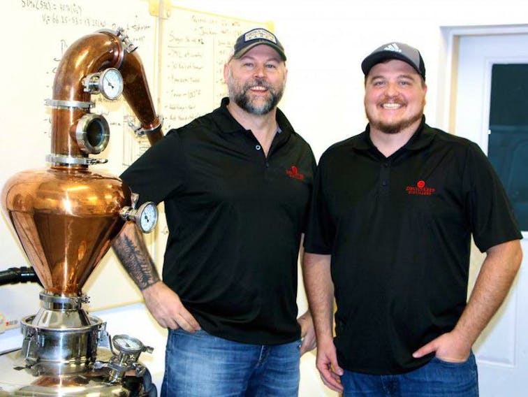 Joe Allen, left, and Ray Fitzpatrick have won a platinum award from the International Spirits Competition in San Francisco for the vodka they distill at their Devil’s Keep Distillery just outside Fredericton.