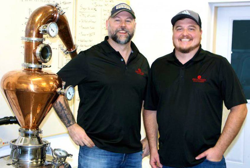 Joe Allen, left, and Ray Fitzpatrick have won a platinum award from the International Spirits Competition in San Francisco for the vodka they distill at their Devil’s Keep Distillery just outside Fredericton.