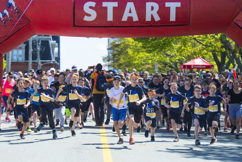 Kids take off from the starting line in the Doctors Nova Scotia two-kilometre youth run on Saturday morning.
